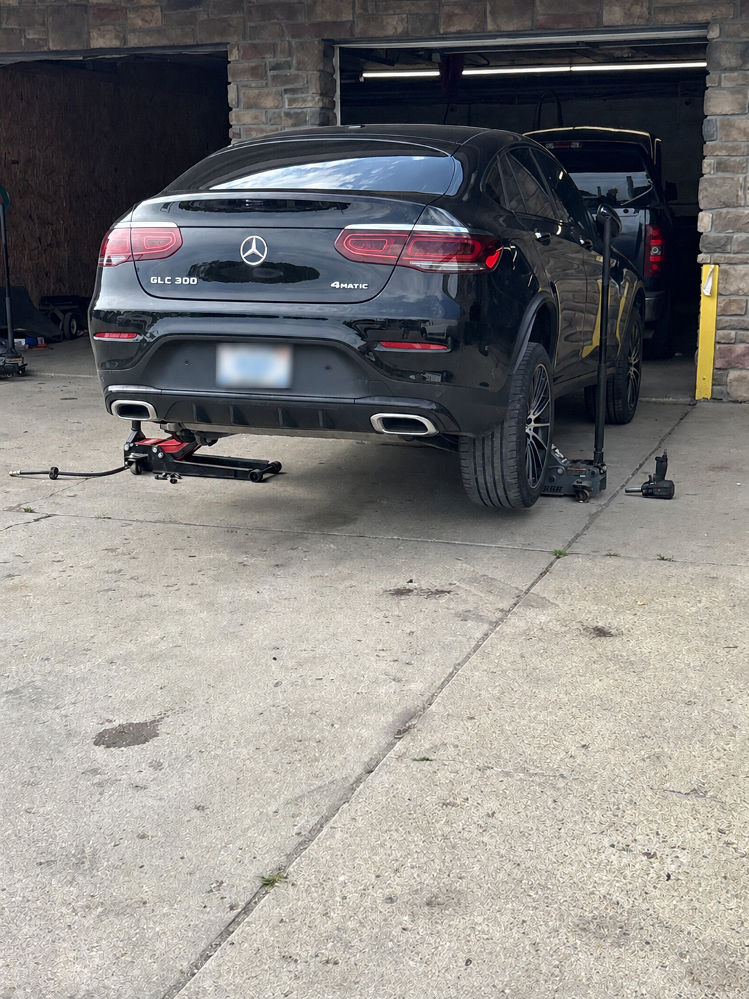 Vehicle at the Montcalm Auto Repair shop entrance
